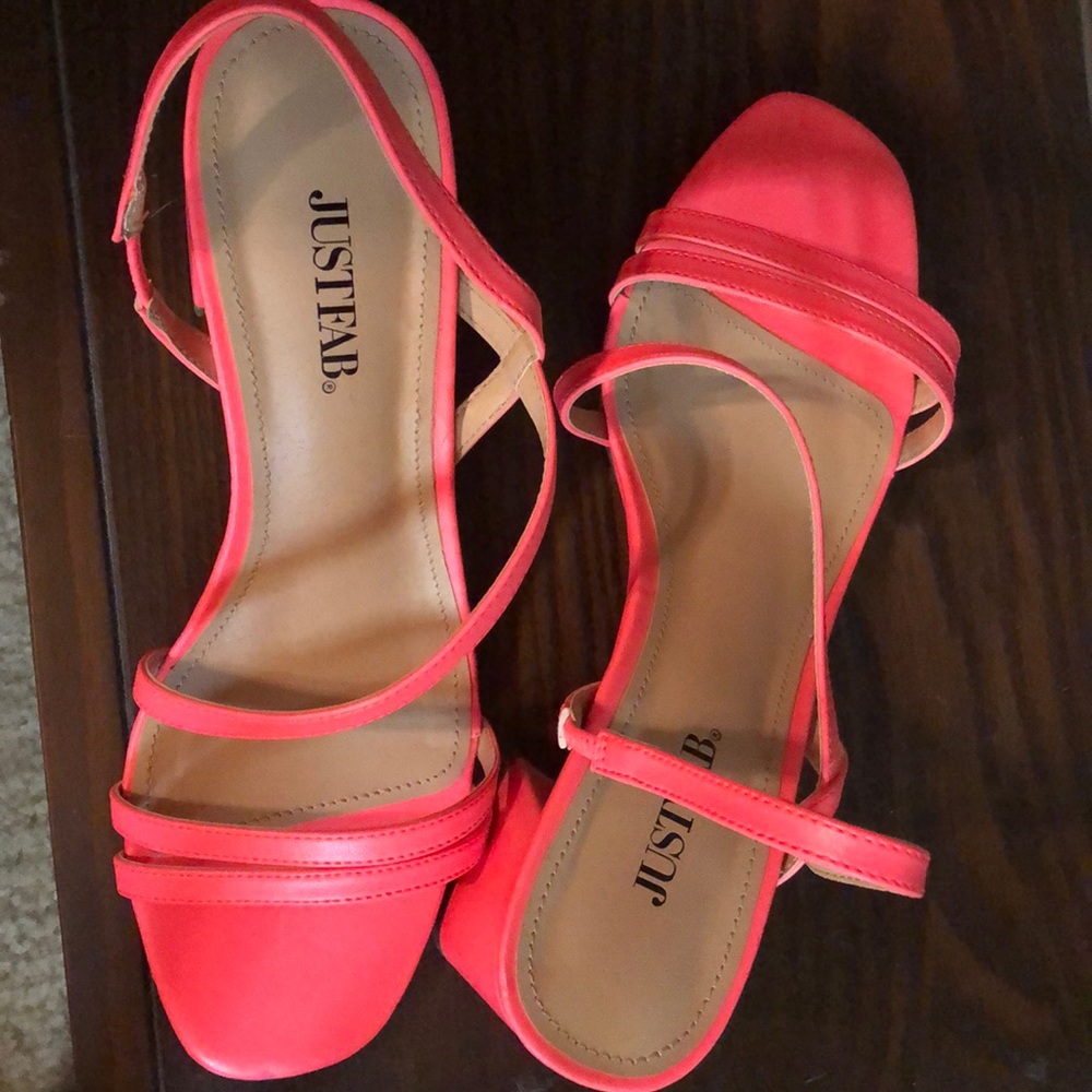 Pink chunky heel sandal.